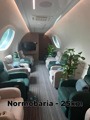 a row of empty seats on an airplane at Miodowy Raj in Targanice