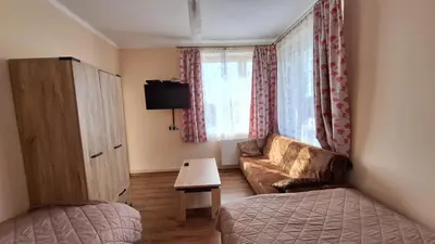 a small living room with a couch and a table at Mieszkanko na peryferiach in Chrzanów