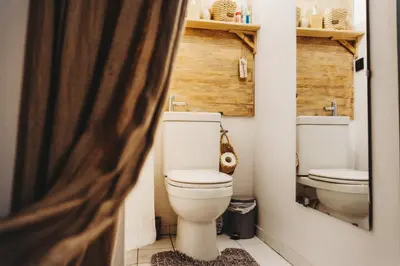 a bathroom with a toilet and a sink at Kieszonka dla singla in Kraków