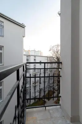 a balcony with a view of a building at Kazimierz Studio with Jacuzzi by Renters Prestige in Kraków