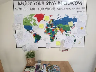 a map of the world hanging on a wall at Stay in the Heart of Kraków in Kraków