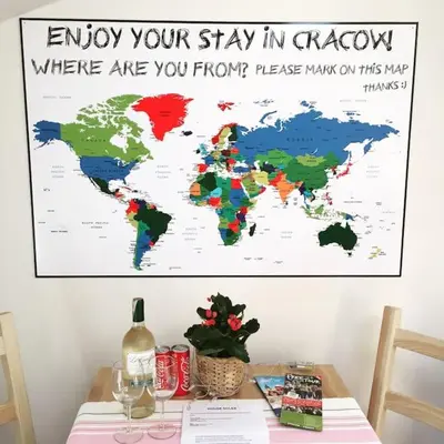 a map of the world hanging on a wall at Stay in the Heart of Kraków in Kraków