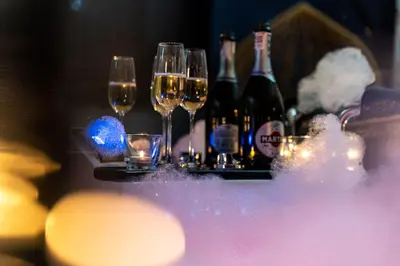 a group of wine glasses and bottles of beer at Exclusive Apartment Centrum 2 in Wadowice