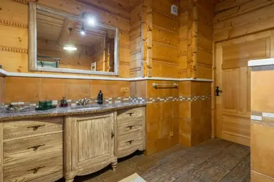 a bathroom with a sink and a mirror at Willa Sołdrówka in Kocierz Rychwałdzki