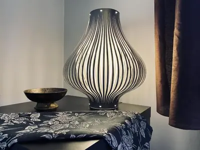 a black and white vase sitting on top of a table at Apartment next to Wawel Castle, Vistula River & Old Town Cracow in Kraków
