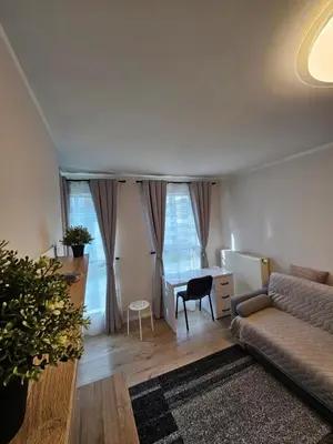 a collage of photos of a apartment in a building at Apartament Anastazja FREE PARKING in Kraków
