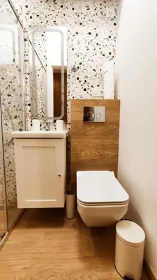a bathroom with a toilet and a sink and a mirror at Daszyńskiego 18 by Homeprime in Kraków