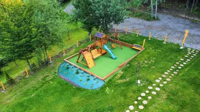 an aerial view of a playground in a park at Leśne Zacisze Iwkowa in Iwkowa