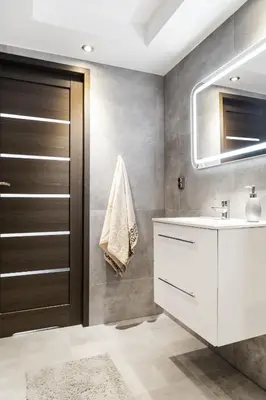 a bathroom with a white sink and a mirror at Bacówka na Kubanówce in Rdzawka