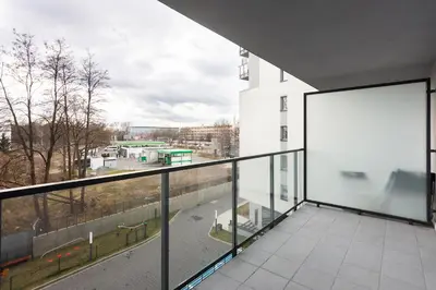 an empty balcony with a view of a city at Family Apartment Nearto Old Town Vermelo by NEARTOpl in Kraków