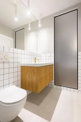 a white bathroom with a toilet and a sink at Family Apartment Nearto Old Town Vermelo by NEARTOpl in Kraków