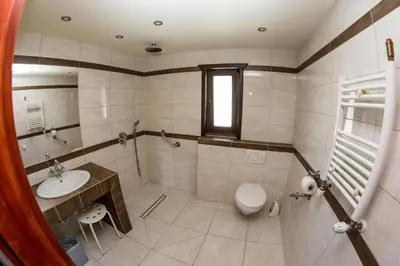 a bathroom with a sink and a toilet at Noclegi-Dobczyce in Dobczyce