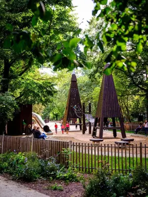 a park with a playground with a play structure at Silent blue apartment / Kochanowskigo St in Kraków