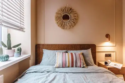 a bedroom with a bed and a mirror on the wall at Old Town Apartment Kraków in Kraków