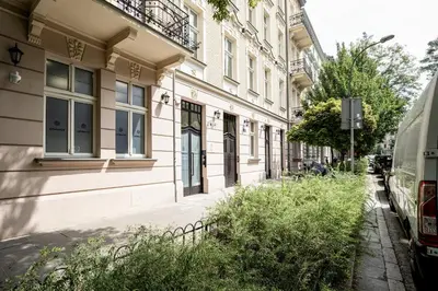 a building on the side of a street at Cozy Apartment in Old Town in Kraków