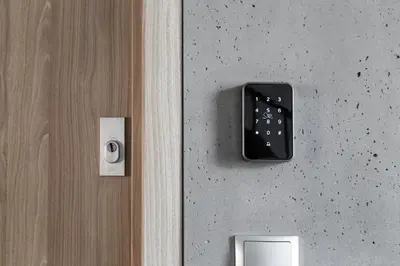 a close up of a door with a remote control at HOUSEHOST Apartment: Miodowa 42/30 Street in Kraków
