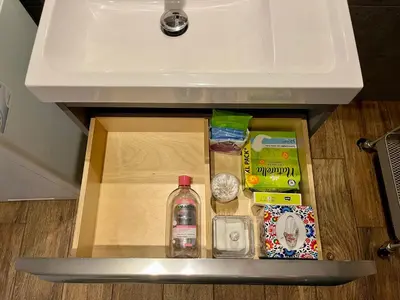 a drawer in a sink with some food in it at Steam Park Rakowicka Koper Apartment in Kraków