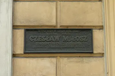 a sign on the side of a building at POETICA APARTMENT in Kraków
