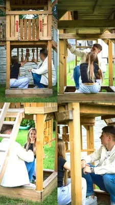 a group of people sitting in a play house at Calm Village in Zator