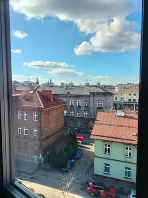 a view from a window of a city with buildings at Uroczy apartament w centrum Krakowa in Kraków