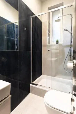 a bathroom with a shower and a toilet at Silent Place in Heart of Krakow near Main Station in Kraków