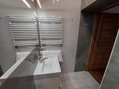 a bathroom with a sink and a shower at Silent Place in Heart of Krakow near Main Station in Kraków
