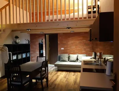 a living room with a couch and a table at Silent Place in Heart of Krakow near Main Station in Kraków
