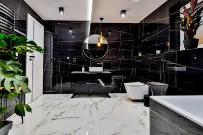 a black bathroom with a sink and a mirror at Nowoczesne Apartamenty typu Superior - Bulwary Rabka Zdrój - Balia - Blisko Park Zdrojowy in Rabka