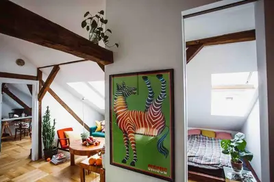 a painting of a zebra on a wall in a room at HAPPY MOMENTS APARTMENTS in Kraków