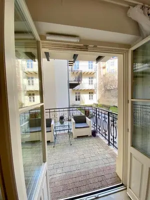 a balcony with a view of a building at Luxury Panda Apartment in Old Town in Kraków