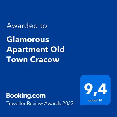 a blue sign with the text awarded to a dangerous appointment old town croquet at Glamorous Apartment Old Town Cracow in Kraków