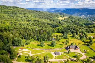 an aerial view of a park in the mountains at Luksusowy domek z jaskinią SPA - Osada Jaworzyny in Tokarnia