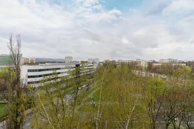 arial view of a city with buildings and trees at Apartments Kraków Czarnowiejska by Noclegi Renters in Kraków