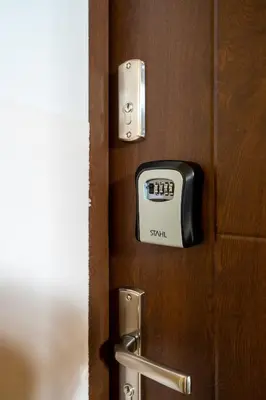 a lock on a door with a clock on it at Staymoovers - Ladne mieszkanie w poblizu Energylandii - Parking in Zator
