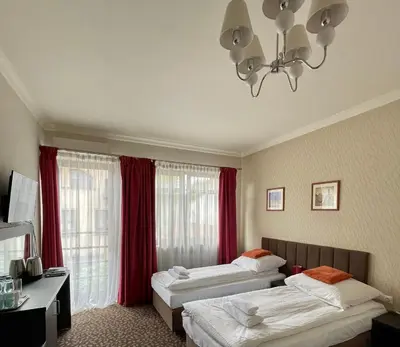 a bedroom with a large bed in a room at Apartamenty Centrum in Olkusz