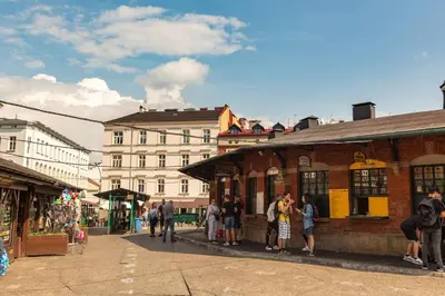 a group of people standing outside of a building at Apartament w sercu krakowskiego Kazimierza in Kraków