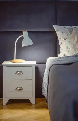 a white nightstand with a lamp next to a bed at Kana - Stylish Apartment in Kraków Pomorska - Close, WiFi, Smart TV in Kraków