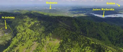 an aerial view of a forested area with mountains at RESETówka nr 2 - domek rodzinny na odludziu in Jaszczurowa