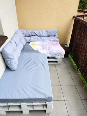 two beds are sitting on a balcony at *** Cozy and bright apartment (over 50m2) *** in Kraków
