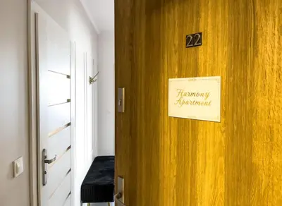 a sign on a door with a pharmacy sign on it at HARMONY Apartment - Zator Energylandia in Zator