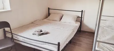a small bedroom with a bunk bed with a mirror at Noclegi u Eli Zator Energylandia in Zator