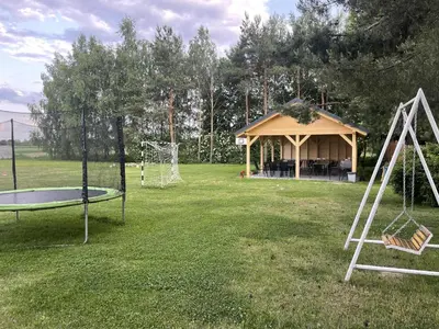 a gazebo with a trampoline and a trampoline at Noclegi u Eli Zator Energylandia in Zator