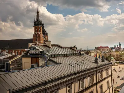 a view of a building with a clock tower at CracWoW City Center Apartment in Kraków