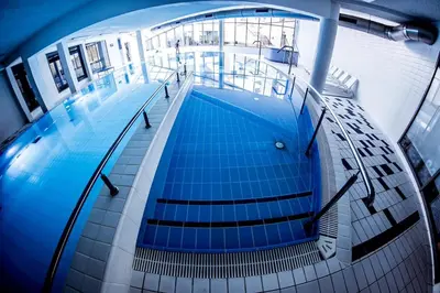 an empty swimming pool on a cruise ship at Premium Apartment for Old Town & Jewish Quarter plus Pool in Kraków