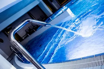 a close up of a bath tub with a water hose at Premium Apartment for Old Town & Jewish Quarter plus Pool in Kraków