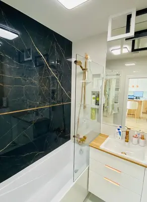 a bathroom with a shower and a sink at Luxury White Apartment in Park Lotników in Kraków