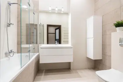 a bathroom with a sink and a glass shower at Spacious Apartment Around The Food Market - 5' to the Market Square - by Upstairs in Kraków