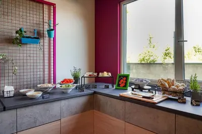 a kitchen with bowls of food on a counter at Easy One Premium Art in Kraków