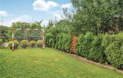 a soccer goal in front of a hedge at Ranczo in Mogilany