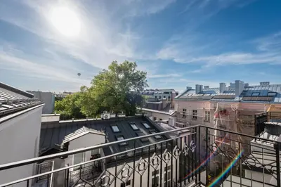 a view of a city from a balcony at Wegierska Luxury Loft WAWELOFTS in Kraków